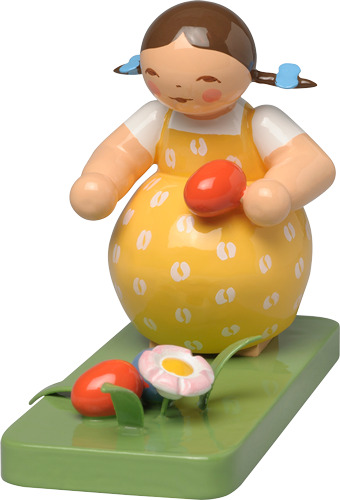 Mädchen am Osternest