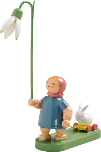 Mädchen mit Schneeglöckchen