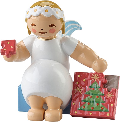 Margeritenengel, sitzend, mit Puzzle