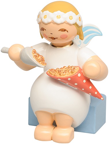 Margeritenengel, sitzend, mit gebrannten Mandeln