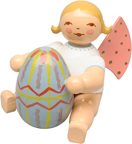 Engel mit blauem Osterei, sitzend