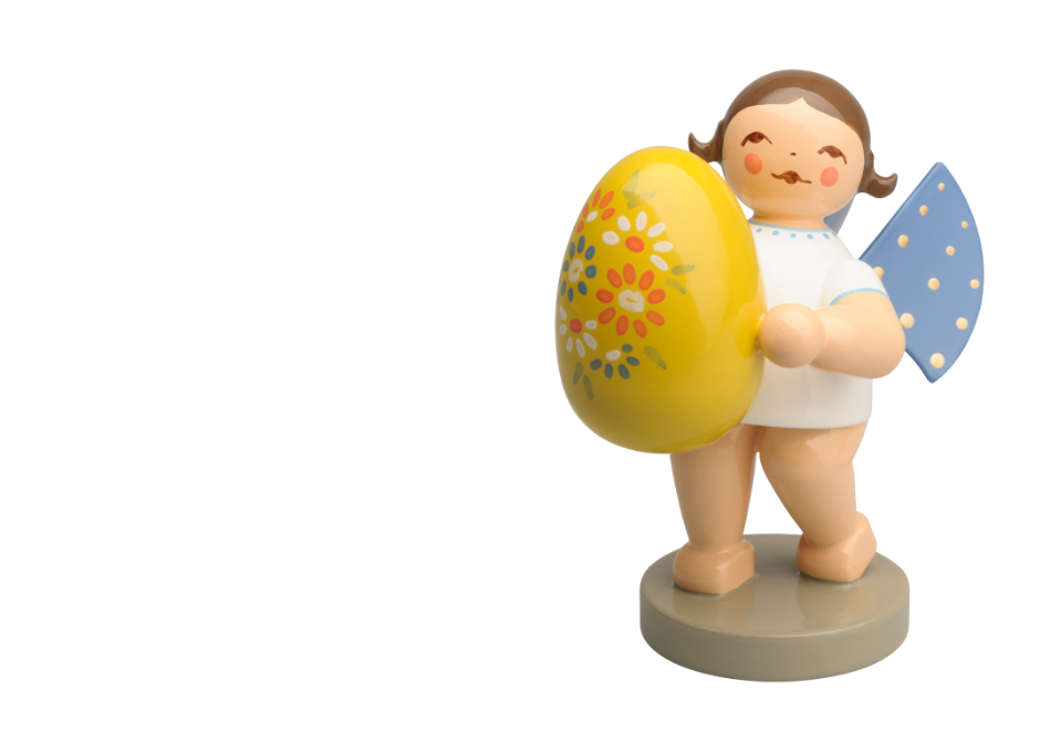 Engelsfigur mit gelbem Osterei